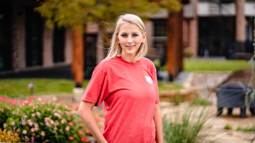 Smiling women wearing a red shirt